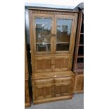 ERCOL ELM CABINET WITH 2 GLASS PANEL DOORS & 2 PANEL DOORS OVER BASE OF 2 DRAWERS OVER 2 PANEL