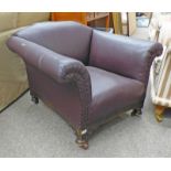 19TH CENTURY BROWN LEATHER CLUB ARMCHAIR WITH CARVED OAK FRAME ON TURNED SUPPORTS