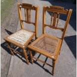 PAIR OF LATE 19TH CENTURY WALNUT FRAMED HAND CHAIRS WITH BERGERE SEATS ON SQUARE SUPPORTS