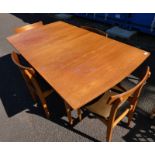 TEAK EXTENDING DINING TABLE WITH EXTRA LEAF ON TURNED SUPPORTS AND SET OF 4 TEAK CHAIRS.