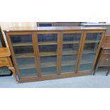 MAHOGANY BOOKCASE WITH 4 GLASS PANEL DOORS & ADJUSTABLE SHELVES MARKED 139670 WYLIE & LOCHHEAD LTD