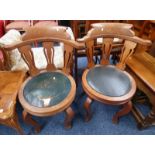 PAIR OF OAK CHAIRS ON SHAPED SUPPORTS
