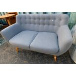 GREY OVERSTUFFED BUTTON BACK SETTEE ON TAPERED SUPPORTS