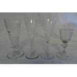 FOUR GLASSES WITH ETCHED DECORATION .