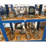 SELECTION OF VARIOUS BAROMETERS OVER TWO SHELVES