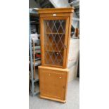 WALNUT CORNER CABINET WITH GLASS PANEL DOOR OVER PANEL DOOR,