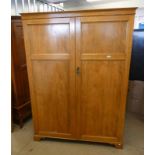 LATE 19TH CENTURY SATINWOOD GENTLEMAN'S WARDROBE WITH FITTED INTERIOR