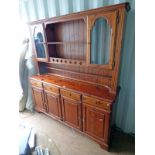 PINE DRESSER WITH SHELF BACK WITH 2 GLASS PANEL DOORS OVER BASE OF 4 DRAWERS OVER 4 PANEL