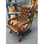 MAHOGANY FRAMED BUTTON BACK LEATHER ARMCHAIR ON X SUPPORTS