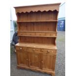 PINE DRESSER WITH SHELF BACK WITH 4 DRAWERS OVER BASE OF 3 DRAWERS OVER 3 PANEL DOORS WIDTH 120 CM