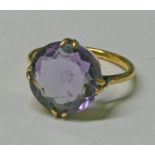 18CT GOLD AMETHYST SET RING, THE CIRCULAR AMETHYST APPROX. 4.8 CARATS, RING SIZE N, 3.