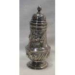 VICTORIAN SILVER SUGAR CASTER WITH FOLIATE EMBOSSED DECORATION, LONDON 1883 - 12CM TALL,
