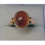 EARLY 20TH CENTURY 9CT GOLD RING SET WITH CABOCHON HARDSTONE - 4.