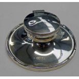 SILVER CAPSTAN INKWELL WITH CIRCULAR CASTELLATED BASE,
