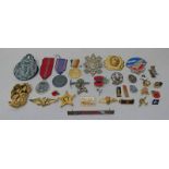 SELECTION OF CAP BADGES, PIN BADGES ETC TO INCLUDE WW2 GERMAN EASTERN MEDAL, NAVAL BUTTONS,