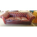 OVERSTUFFED RED LEATHER CHESTERFIELD SETTEE LENGTH 206CM