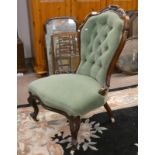 19TH CENTURY CARVED MAHOGANY FRAMED BUTTON BACK LADIES CHAIR ON CABRIOLE SUPPORTS,