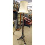 MAHOGANY STANDARD LAMP WITH REEDED COLUMN AND DECORATIVE CARVING ON 3 SPREADING SUPPORTS HEIGHT 163