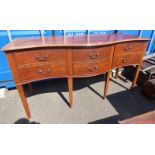 19TH CENTURY MAHOGANY SIDEBOARD OF 6 DRAWERS WITH SERPENTINE FRONT ON SQUARE SUPPORTS,