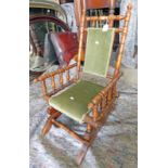 MAHOGANY FRAMED CHILD'S ROCKING ARMCHAIR WITH TURNED DECORATION
