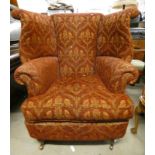 OVERSTUFFED WINGBACK ARMCHAIR LABELLED WADE UPHOLSTERY LIMITED TO BASE