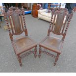 PAIR OF 19TH CENTURY OAK HALL CHAIRS WITH CARVED DECORATION