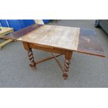 ARTS & CRAFTS STYLE OAK DRAW-LEAF DINING TABLE ON BARLEY TWIST SUPPORTS,