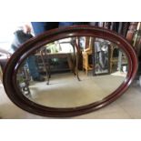 19TH CENTURY ROSEWOOD FRAMED BEVEL EDGED OVAL MIRROR HEIGHT 56 CM X WIDTH 88 CM