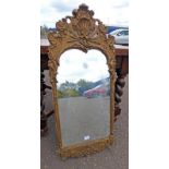 19TH CENTURY GILT MIRROR WITH CARVED DECORATION,