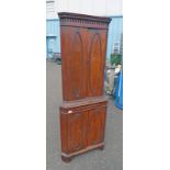 EARLY 20TH CENTURY MAHOGANY CORNER CABINET WITH 2 PANEL DOORS OVER SLIDE WITH 2 PANEL DOORS BELOW