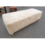SUEDE OVERSTUFFED RECTANGULAR STOOL ON TURNED OAK SUPPORTS,