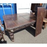 LATE 19TH CENTURY OAK DINING TABLE WITH CARVED DECORATION & TURNED SUPPORTS,