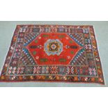 EASTERN RUG WITH RED AND ORANGE DECORATIONS - 244 CM X 180 CM