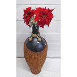 LARGE POTTERY VASE IN WICKER WORK BASKET - 99 CM