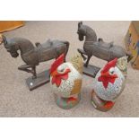 2 CARVED WOODEN HORSES, 37CM TALL, WITH 2 CARVED WOODEN CHICKENS, COLOURFULLY DECORATED,