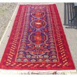 RED & BLUE MIDDLE EASTERN RUG,