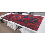 RED AND BLUE GROUND PERSIAN NAHVAN VILLAGE RUG,