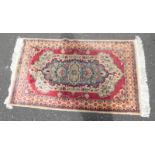 MIDDLE EASTERN STYLE CARPET WITH RED AND CREAM PATTERN - 154 CM X 90 CM