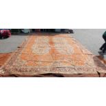 CARPET WITH ORANGE AND CREAM PATTERN - LENGTH 596 CM X 404 CM