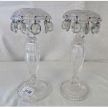 PAIR OF CUT GLASS CANDLESTICKS WITH FACETED DROPS
