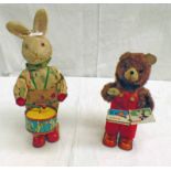 TWO CLOCKWORK TOYS INCLUDING DRUMING RABBIT TOGETHER WITH BEAR READING BOOK