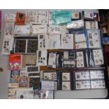 LARGE SELECTION OF FIRST DAY COVERS AND STAMP PACKS TO INCLUDE AN ALBUM OF MINT STAMP PACKS,