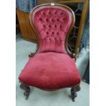 19TH CENTURY MAHOGANY FRAMED BUTTON BACK LADIES ARMCHAIR ON CABRIOLE SUPPORTS