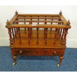 19TH CENTURY INLAID WALNUT CANTERBURY WITH FALSE DRAWER FRONT ON TURNED SUPPORTS.