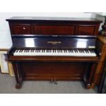 MAHOGANY CASED OVERSTRUNG PIANO BY JOHN BROADWOOD AND SONS.