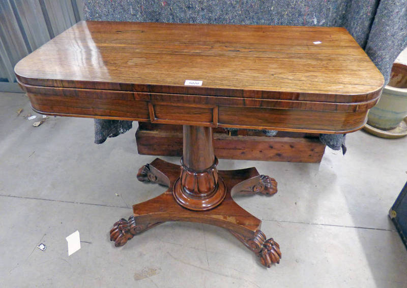 19TH CENTURY ROSEWOOD FLIP TOP GAMES TABLE ON CENTRE PEDESTAL WITH 3 SPREADING PAW FEET 74CM TALL X