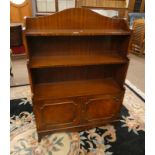 MAHOGANY BOOKCASE WITH OPEN SHELVES OVER 2 PANEL DOORS.