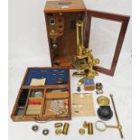 MILLIKIN & LAWLEY GILT METAL MICROSCOPE IN A FITTED AND GLAZED MAHOGANY CASE WITH SEVERAL
