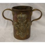 HEAVY BRASS VASE WITH BRASS HANDLES AND HEAVY BRASS COAT OF ARMS TO FRONT,