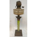 BRASS PARAFFIN LAMP WITH CLEAR GLASS RESERVOIR WITH GREEN AND WHITE COLUMN Condition